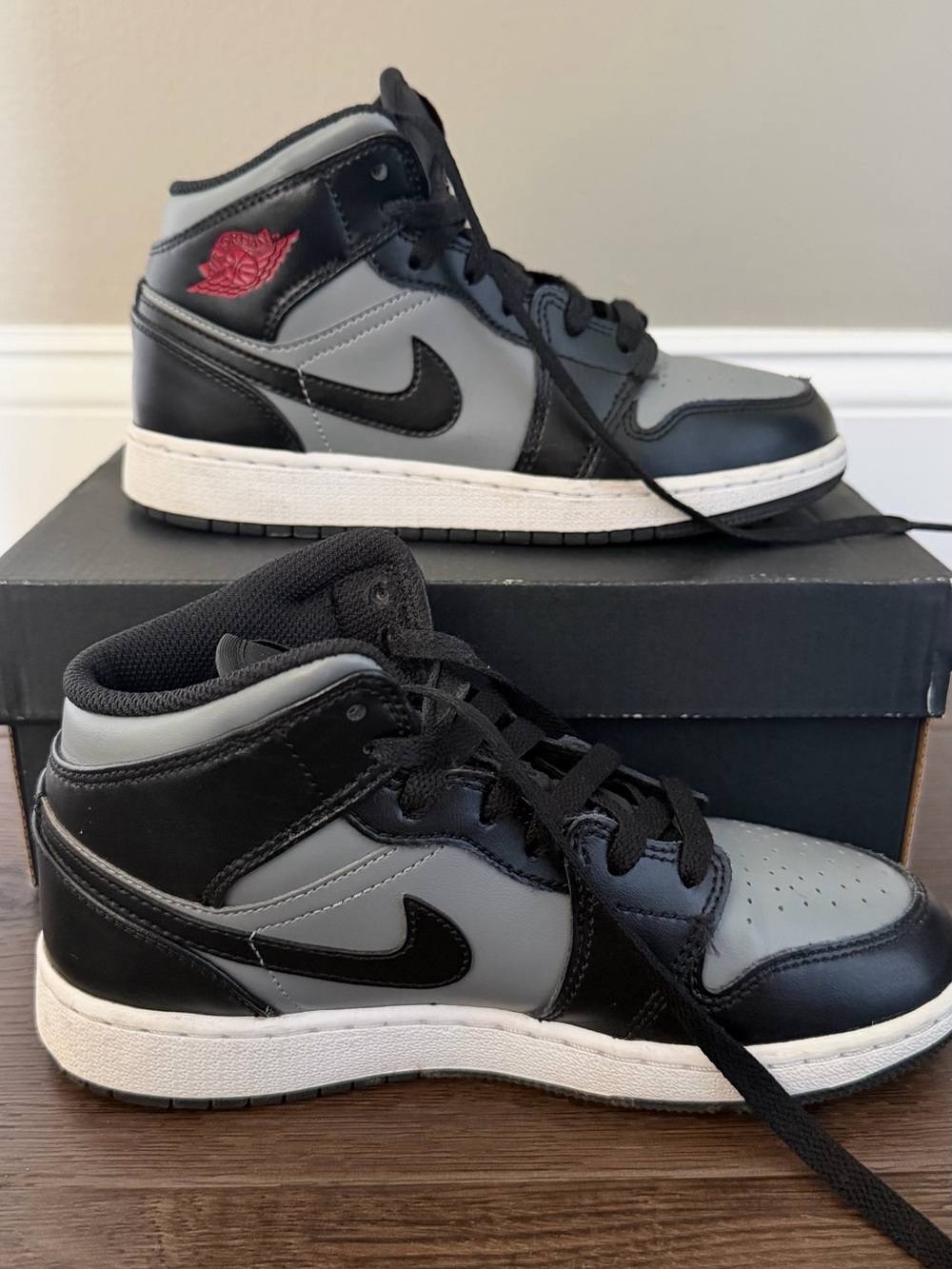 Air Jordan 1 Mid Sneakers in Black, Gray with Red Logo